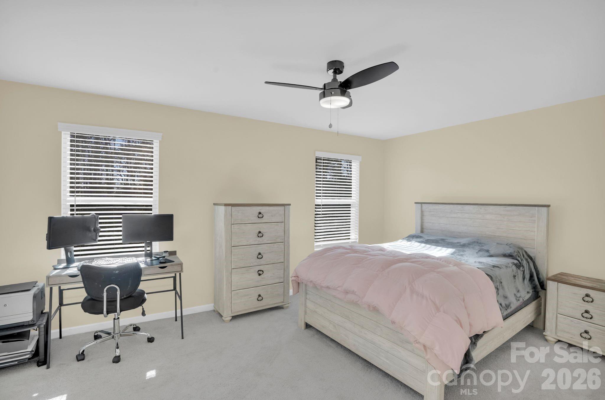 767 Gants Road York, SC 29745 - Photo 21 of 47 a bedroom with a bed and a chair