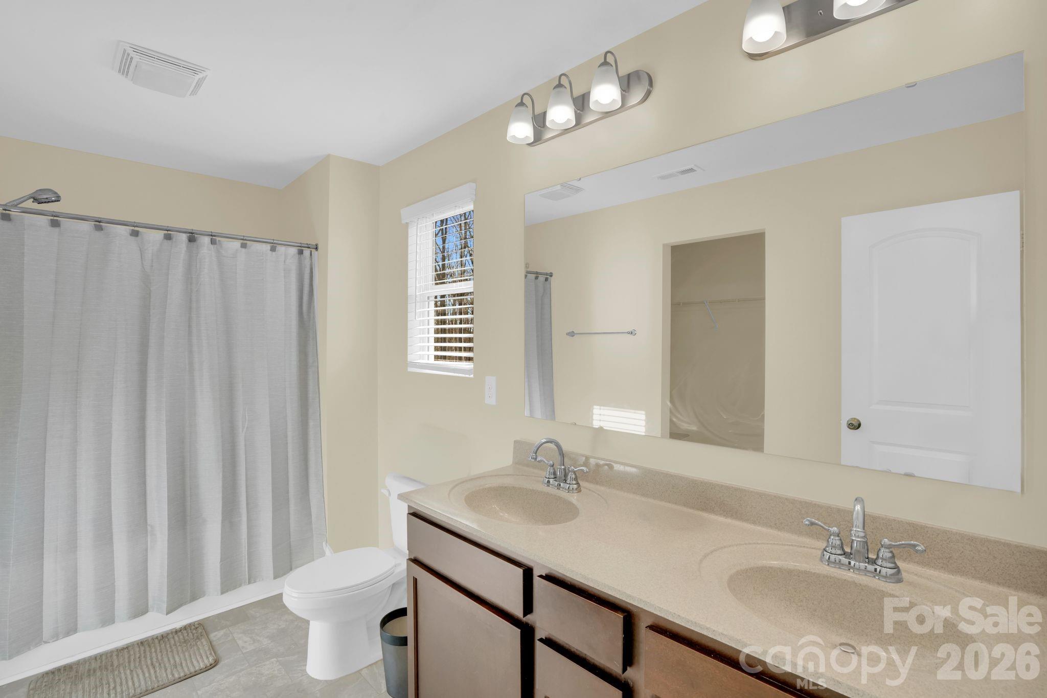 767 Gants Road York, SC 29745 - Photo 24 of 47 a bathroom with a granite countertop sink and a mirror