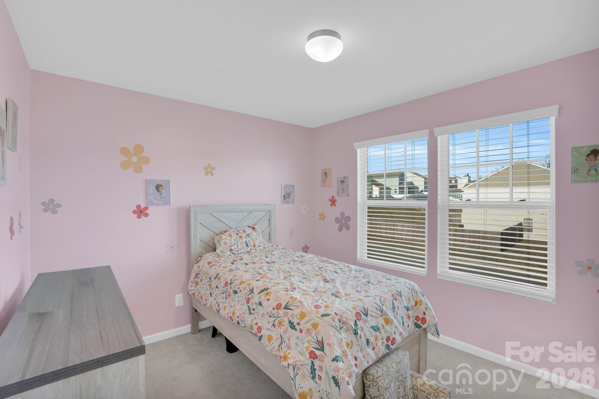 767 Gants Road York, SC 29745 - Photo 32 of 47 a bedroom with a bed and a window