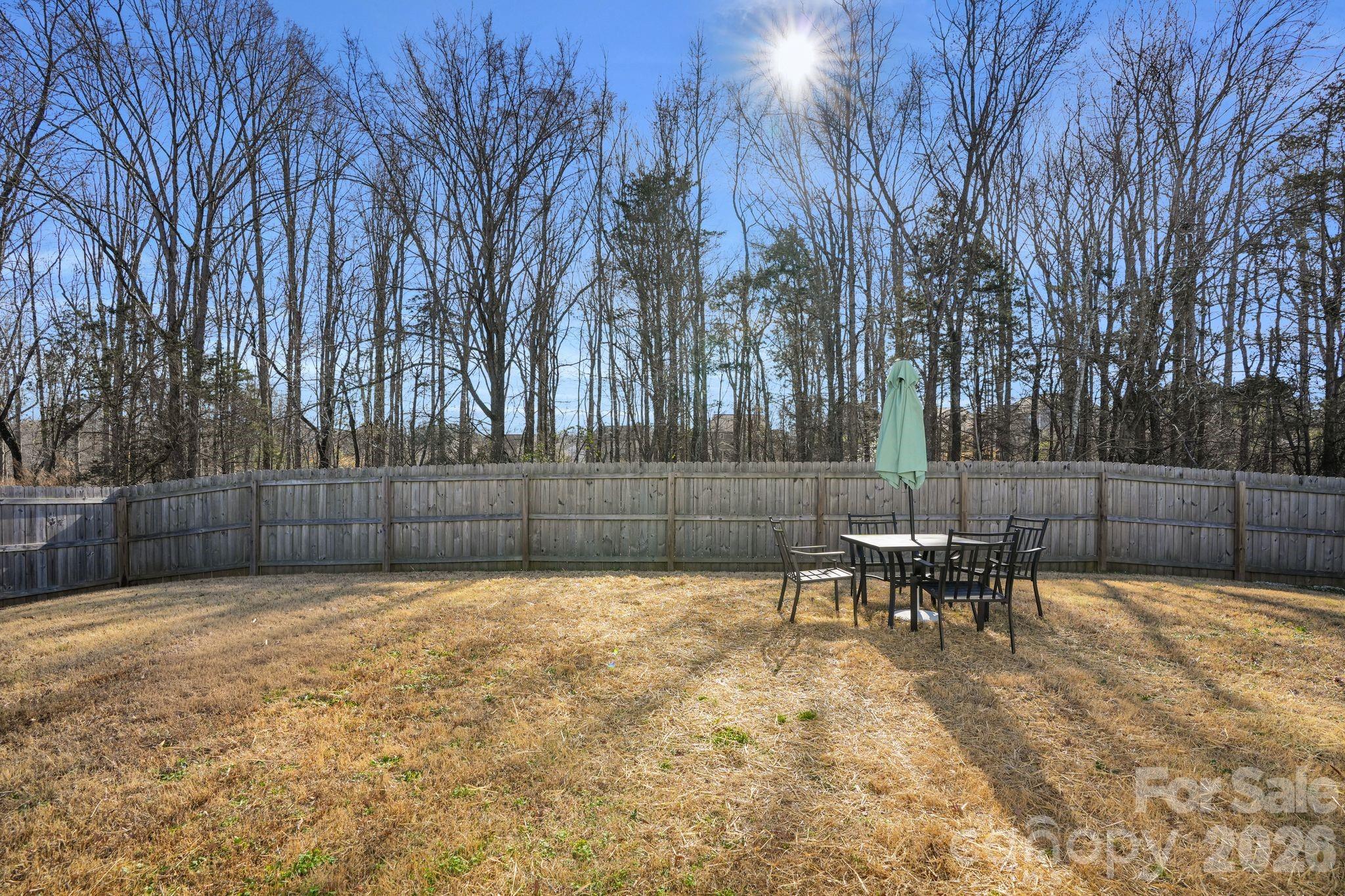 767 Gants Road York, SC 29745 - Photo 46 of 47 a view of a backyard with a bench and bench