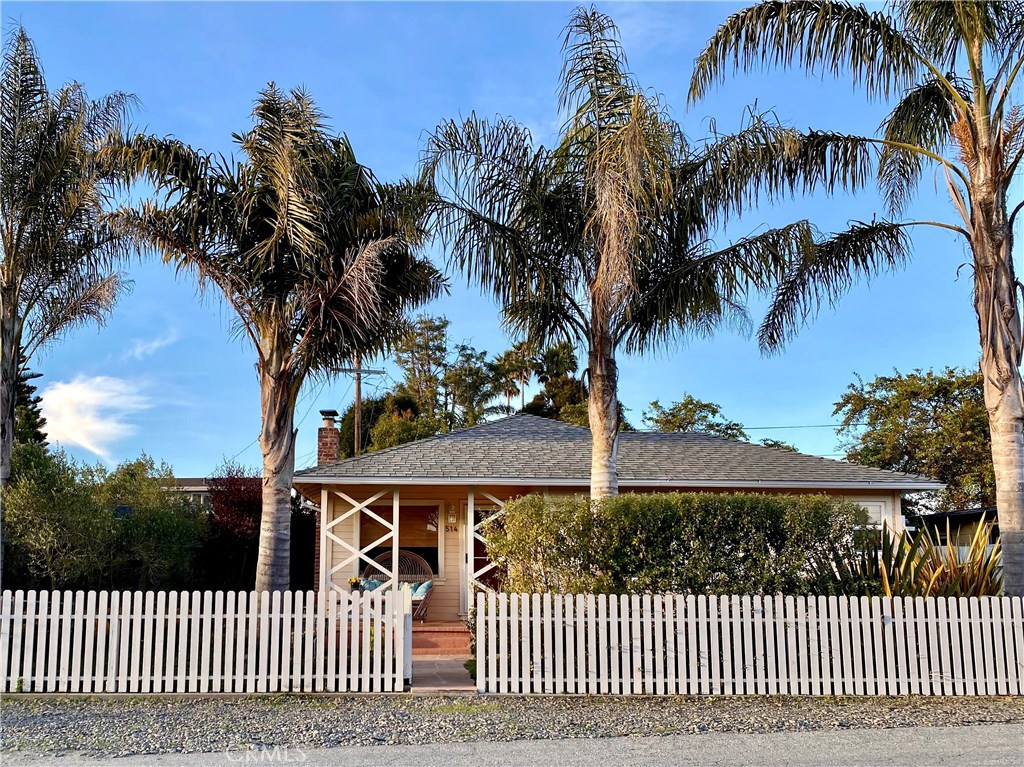 front view of a house with a garden