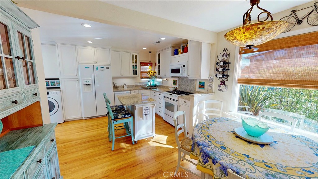 514 Middlefield Drive Aptos, CA 95003 - Photo 16 of 31 a workspace with furniture and wooden floor