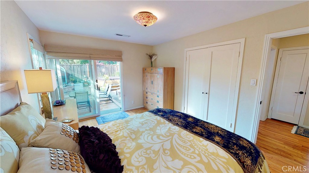 514 Middlefield Drive Aptos, CA 95003 - Photo 25 of 31 a bedroom with a bed and a window