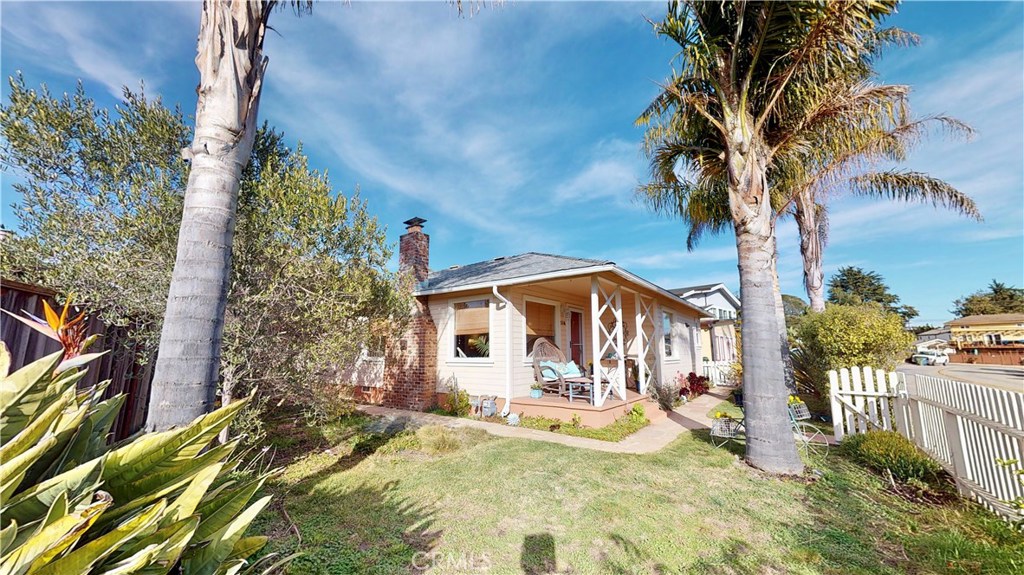 514 Middlefield Drive Aptos, CA 95003 - Photo 4 of 31 a view of a house with backyard and sitting area