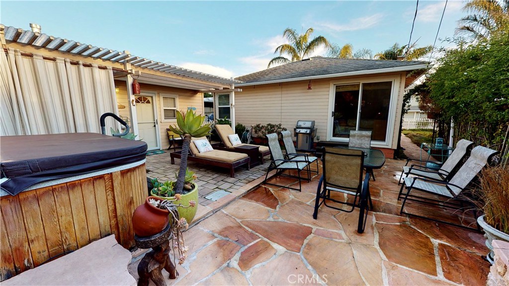 514 Middlefield Drive Aptos, CA 95003 - Photo 5 of 31 a view of a patio with table and chairs with wooden floor and fence