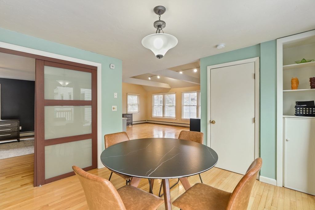 27 Pollard Drive Millis, MA 02054 - Photo 11 of 41 a dining room with furniture and wooden floor