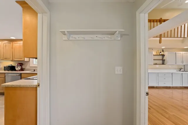 a view of a kitchen from the hallway