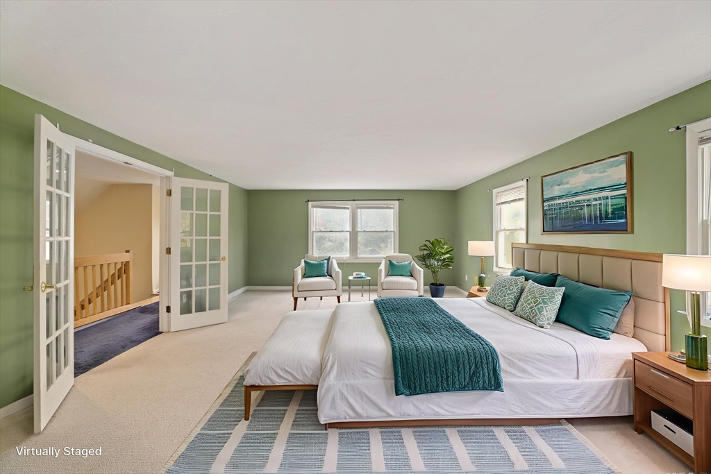 27 Pollard Drive Millis, MA 02054 - Photo 20 of 41 a bedroom with a large bed and a window