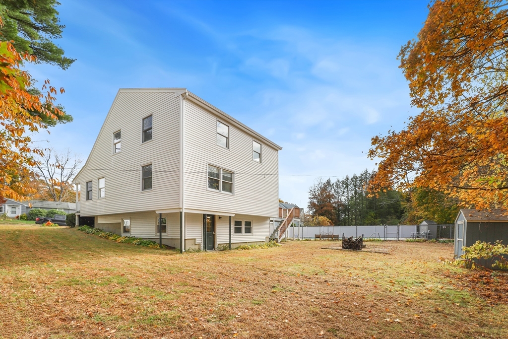 27 Pollard Drive Millis, MA 02054 - Photo 39 of 41 a front view of a house with a yard