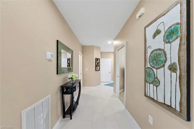 a view of hallway with washer and dryer