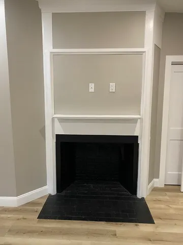 a living room with a fireplace