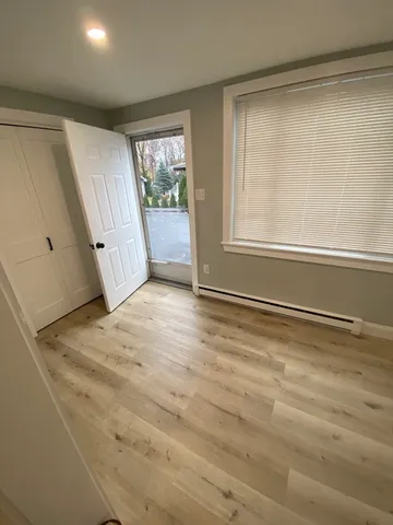 a view of an empty room with a window