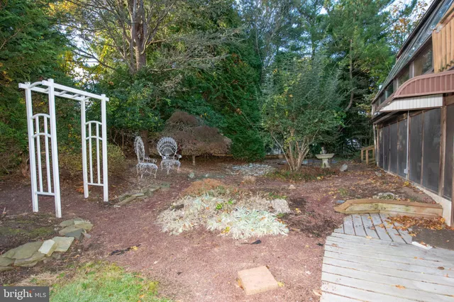 a backyard of a house with seating space