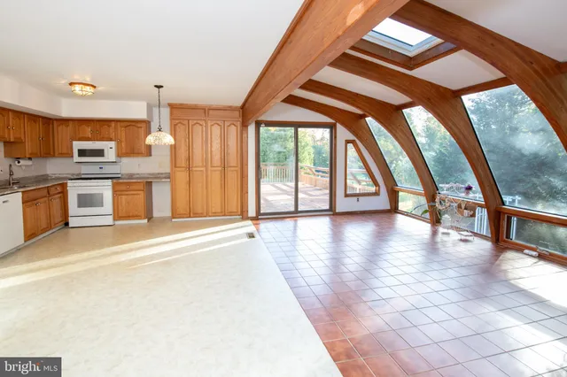 a view of a kitchen with a sink