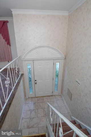 a bathroom with a granite countertop sink and a shower