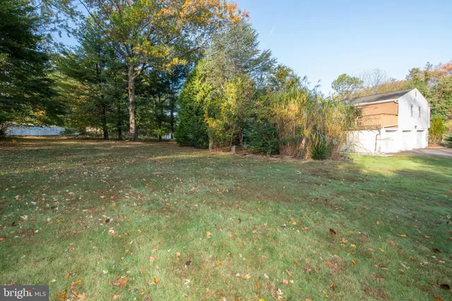 a fire hydrant in the middle of a field