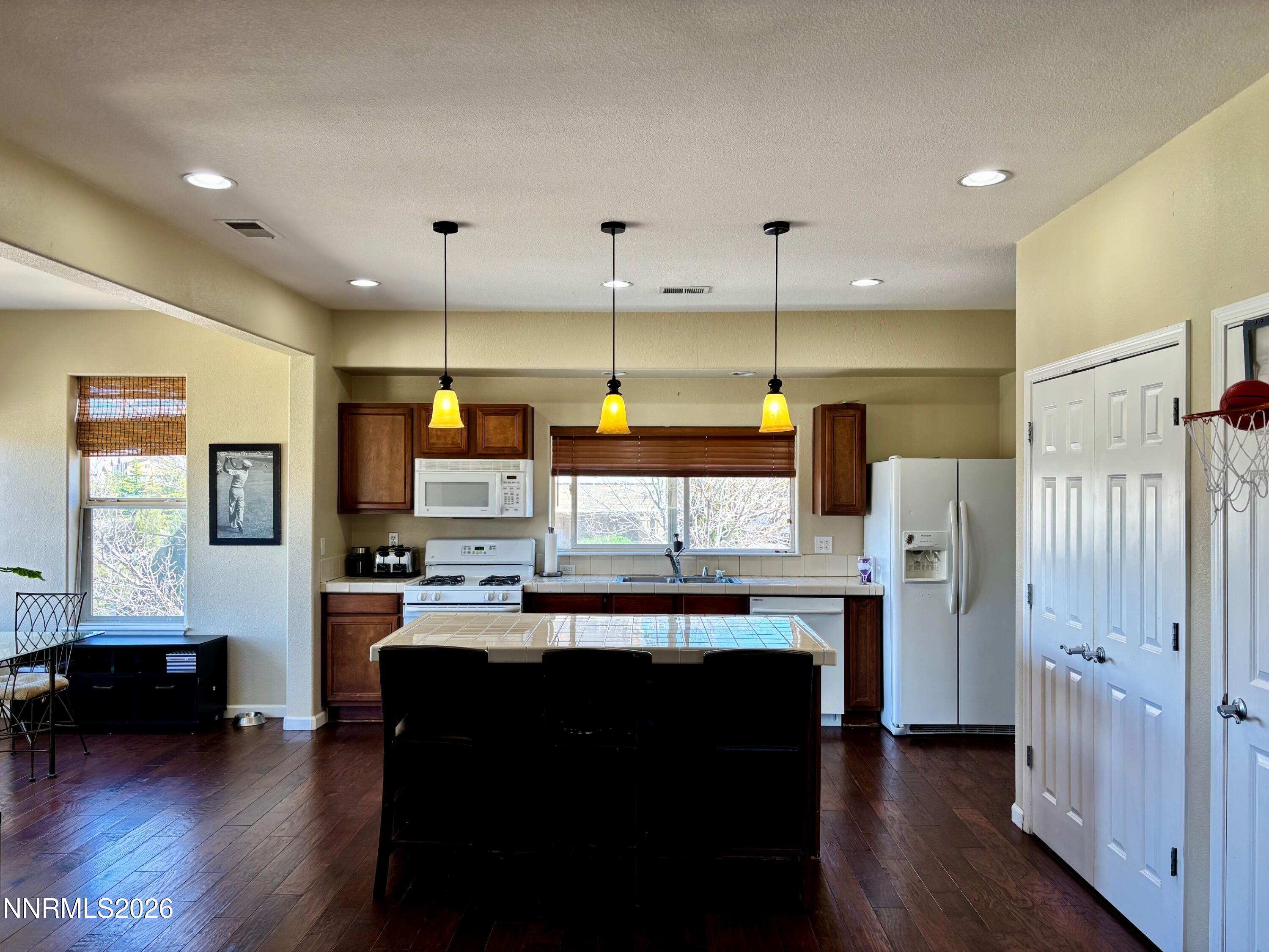 4299 Amber Marie Lane Reno, NV 89503 - Photo 22 of 32 KITCHEN VIEW FROM LIVING ROOM