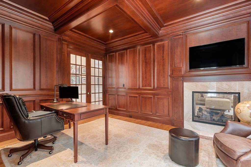 55 Edmunds Road Wellesley, MA 02481 - Photo 12 of 40 a work room with furniture wooden floor and windows