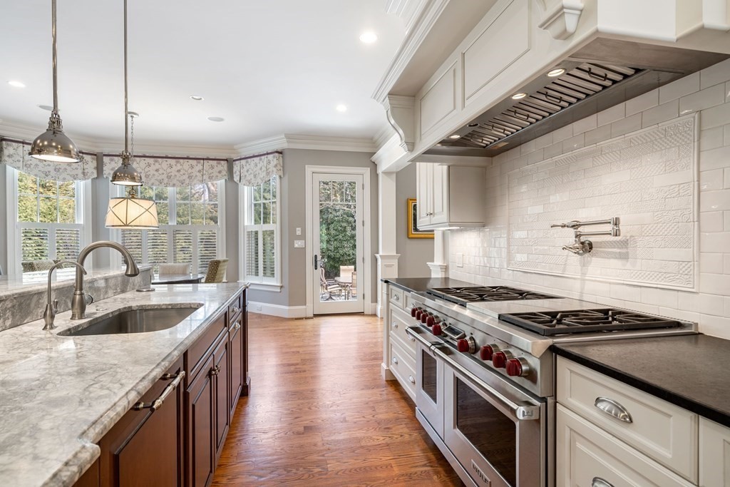 55 Edmunds Road Wellesley, MA 02481 - Photo 16 of 40 a kitchen with a stove and a sink