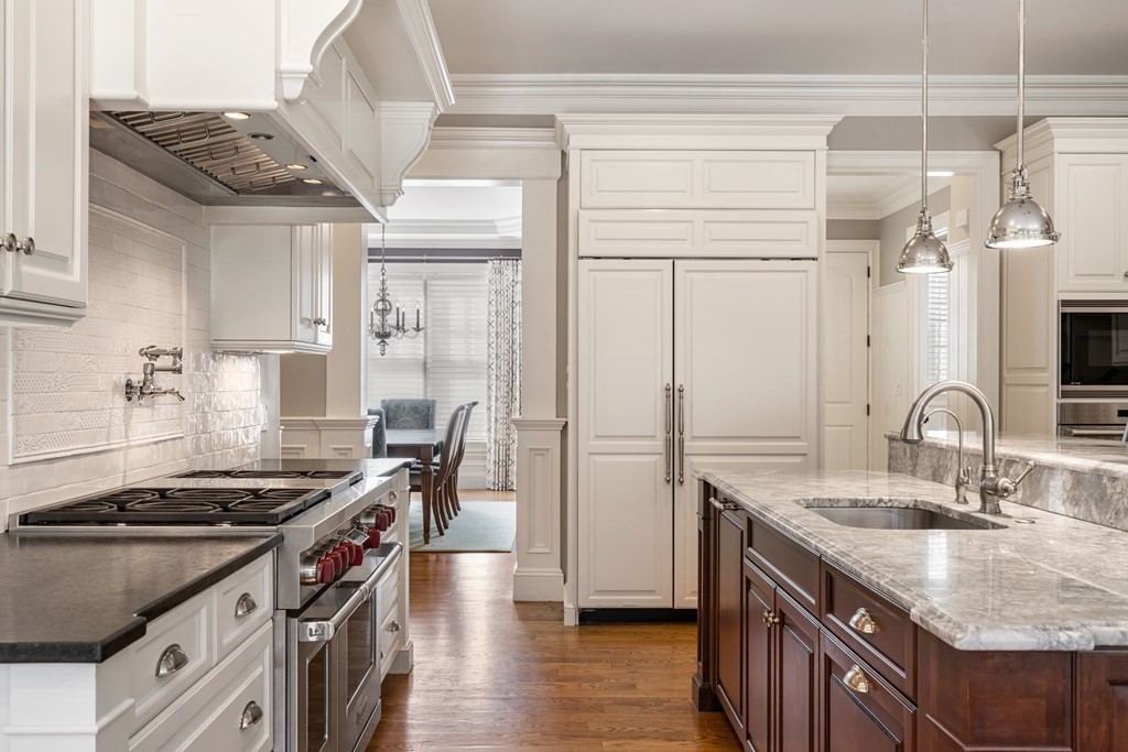 55 Edmunds Road Wellesley, MA 02481 - Photo 17 of 40 a kitchen with a stove and a sink