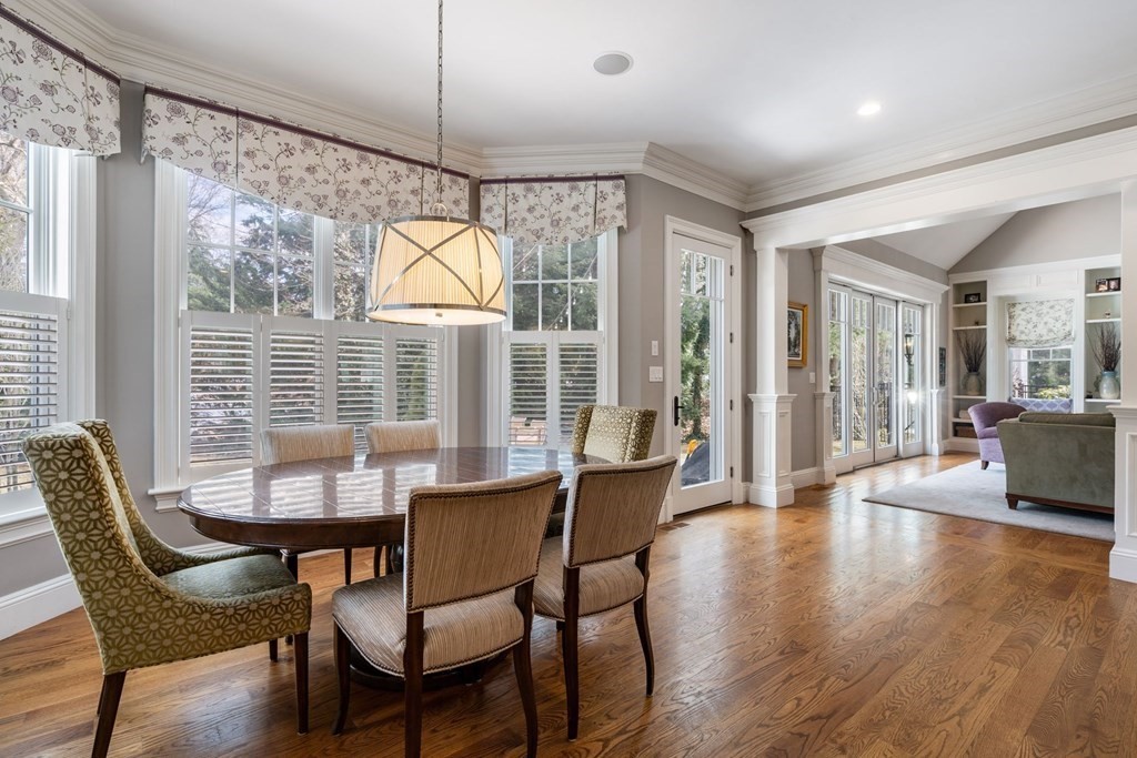 55 Edmunds Road Wellesley, MA 02481 - Photo 18 of 40 a dining room with furniture and wooden floor