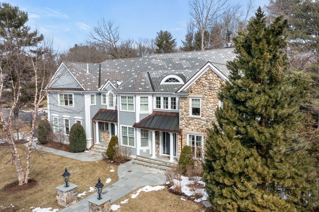 55 Edmunds Road Wellesley, MA 02481 - Photo 2 of 40 a front view of a house with a yard