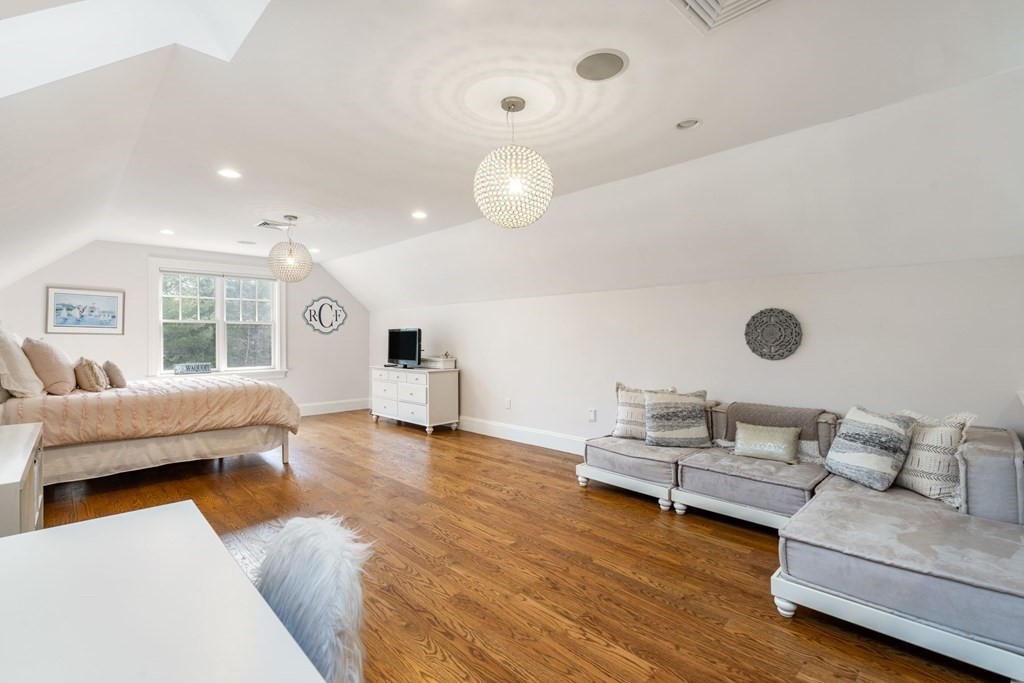 55 Edmunds Road Wellesley, MA 02481 - Photo 28 of 40 a living room with furniture and a wooden floor
