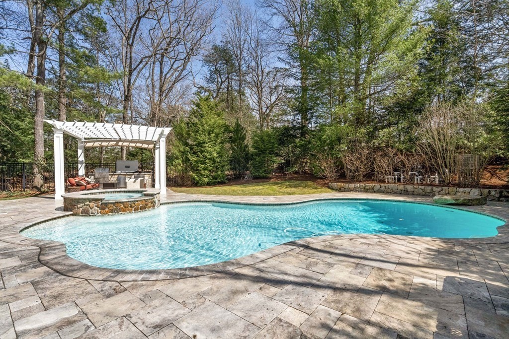 55 Edmunds Road Wellesley, MA 02481 - Photo 36 of 40 a view of outdoor space yard swimming pool and patio