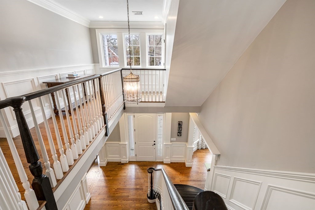 55 Edmunds Road Wellesley, MA 02481 - Photo 6 of 40 a view of an entryway with wooden floor