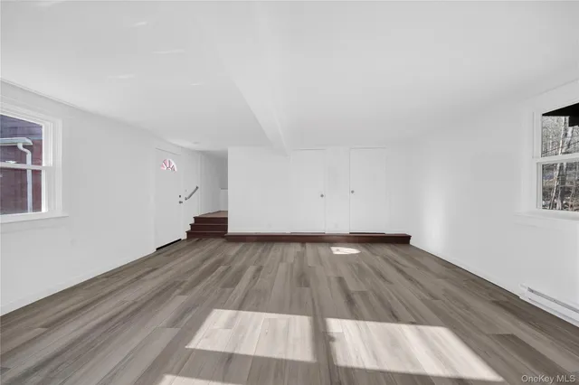 a view of an empty room and window