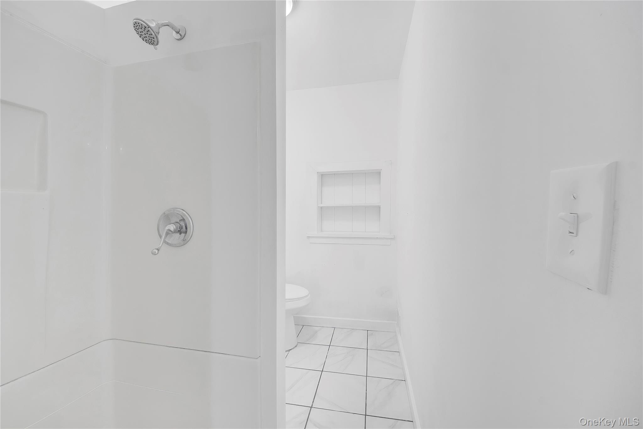 690 Gipsy Trail Road Carmel, NY 10512 - Photo 22 of 35 Bathroom featuring baseboards and a shower