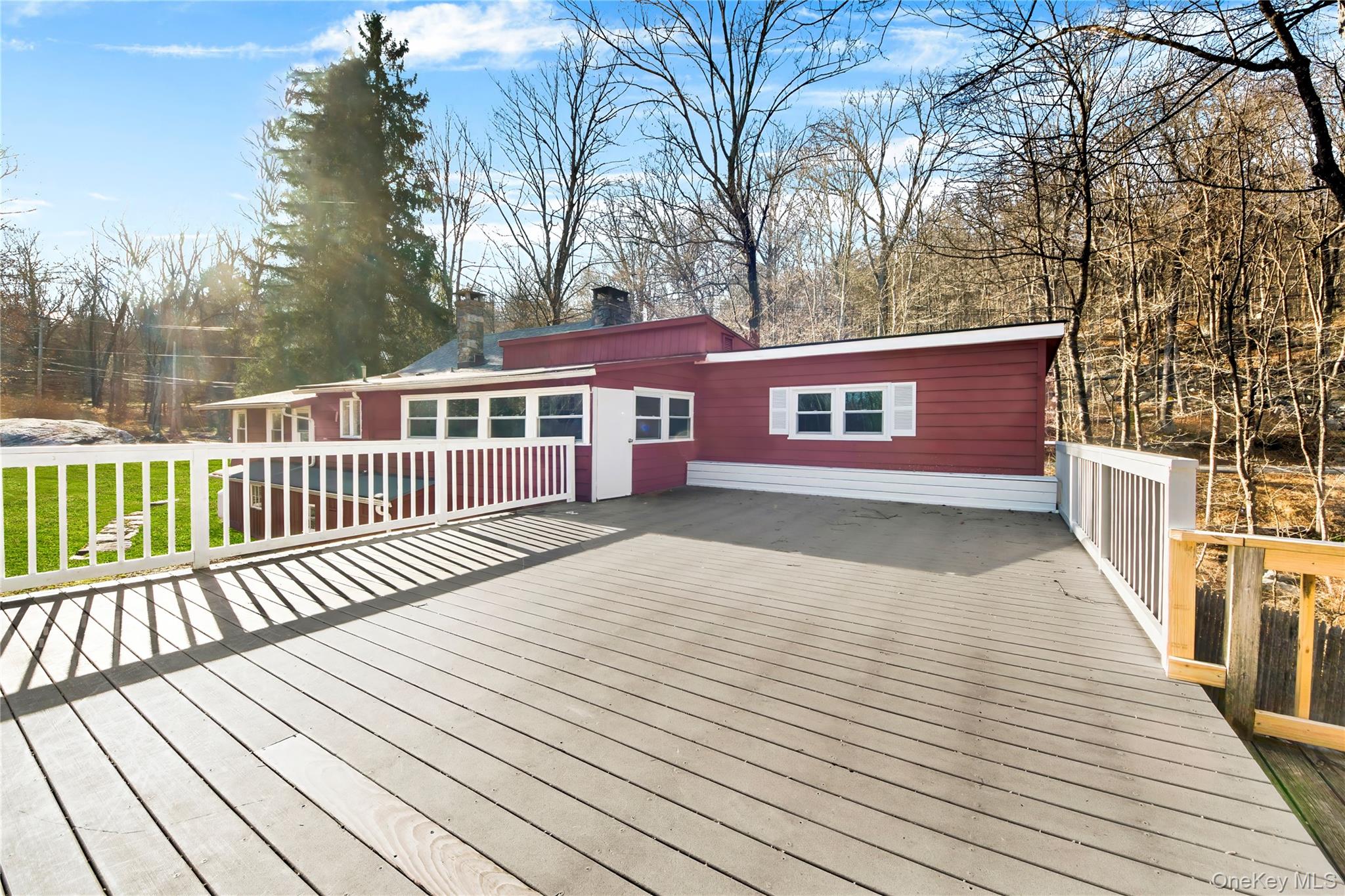 690 Gipsy Trail Road Carmel, NY 10512 - Photo 27 of 35 a view of a house with wooden deck