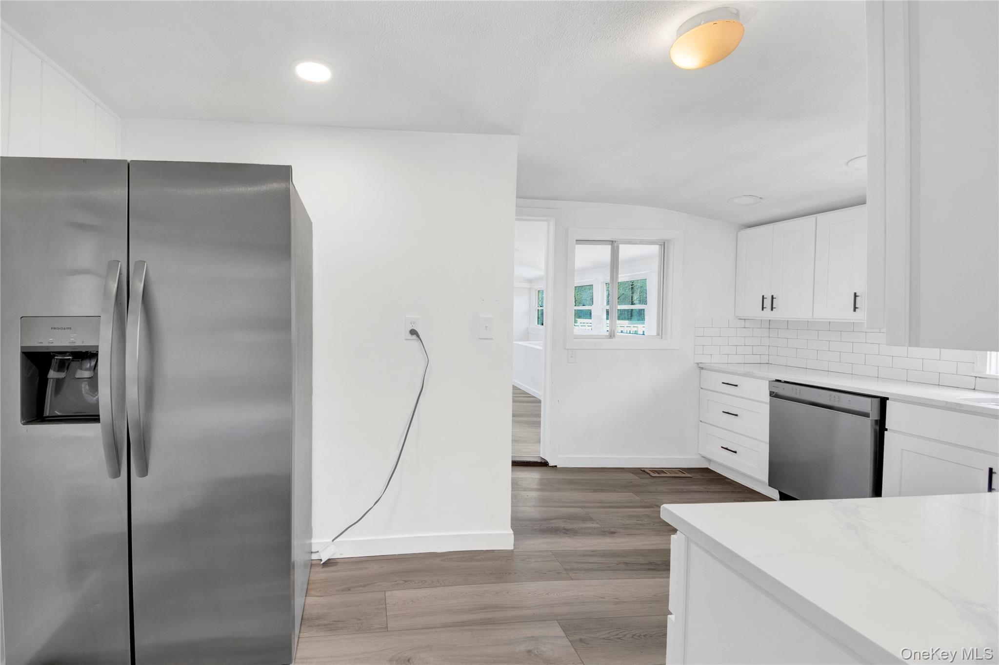 690 Gipsy Trail Road Carmel, NY 10512 - Photo 5 of 35 a kitchen with a refrigerator and a stove