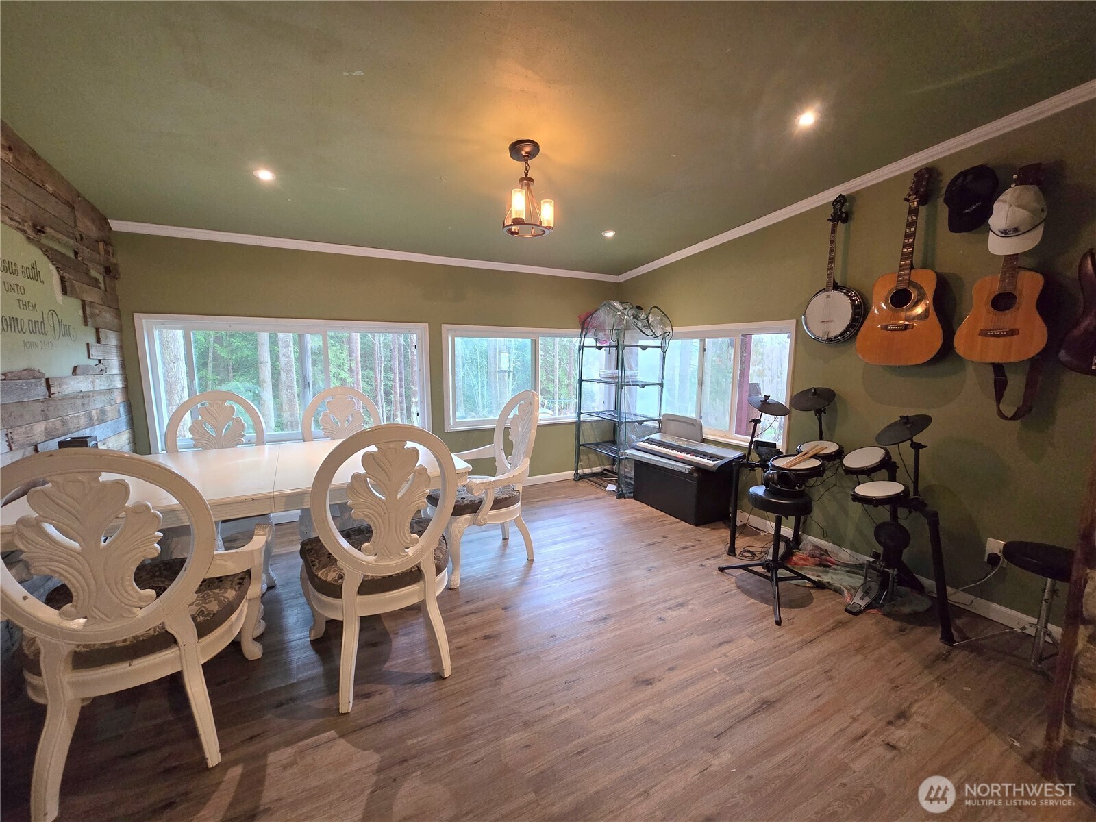 276261 Highway 101 Sequim, WA 98382 - Photo 16 of 33 a living room with furniture and wooden floor