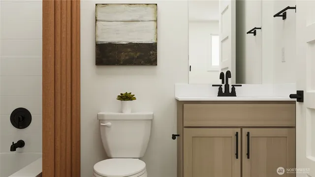 a bedroom with a large bed and dresser with mirror