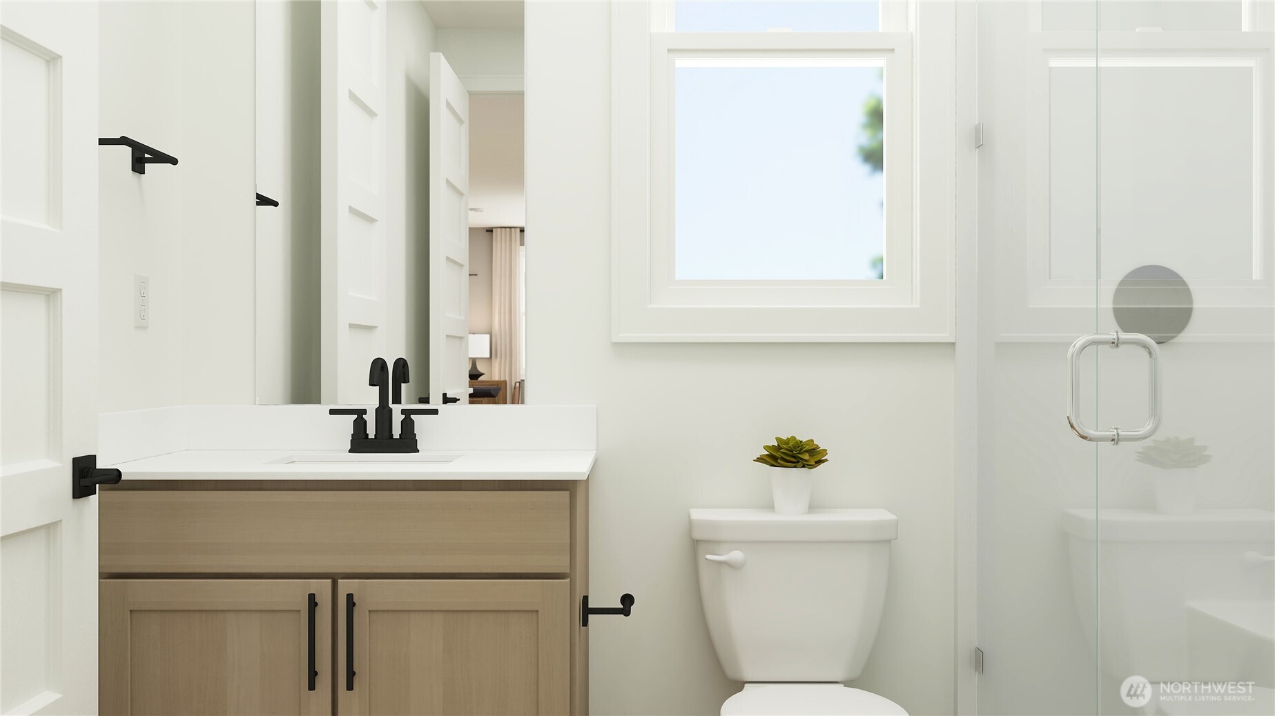 6094 Trce Drive Southwest Port Orchard, WA 98367 - Photo 22 of 33 a bathroom with a sink a toilet and a mirror
