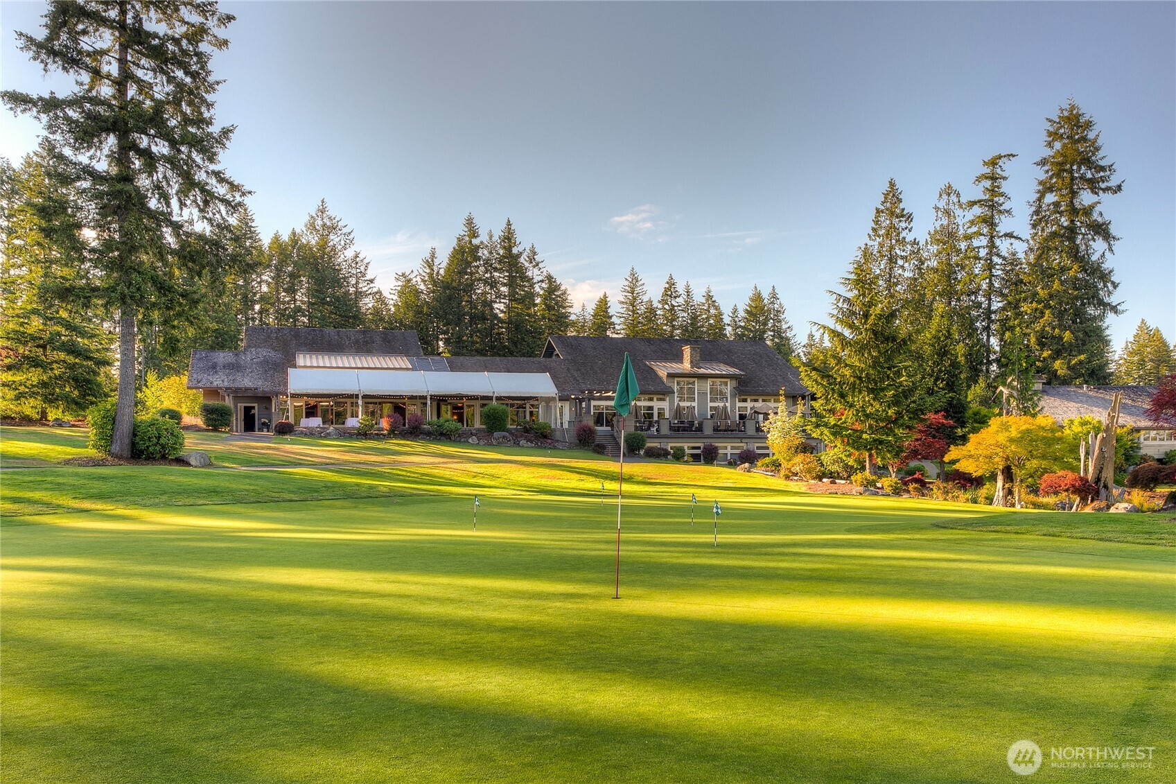 6094 Trce Drive Southwest Port Orchard, WA 98367 - Photo 26 of 33 a view of a swimming pool with an outdoor space and seating area