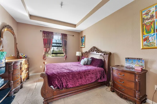 an aerial view of a city with a lake view and mountain view