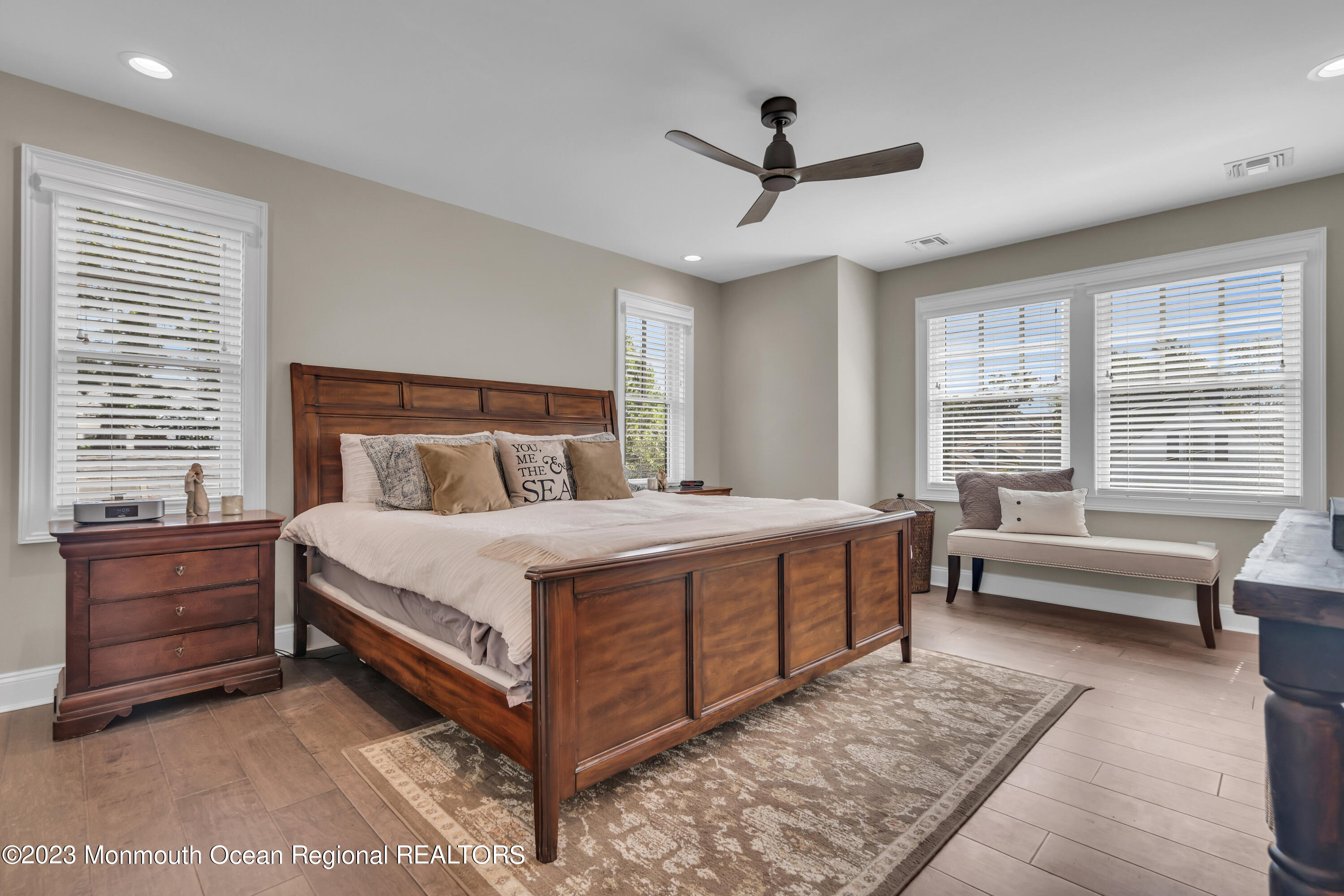 2118 Edgewood Place, Unit JULY Spring Lake, NJ 07762 - Photo 27 of 61 a bedroom with a bed and a large window
