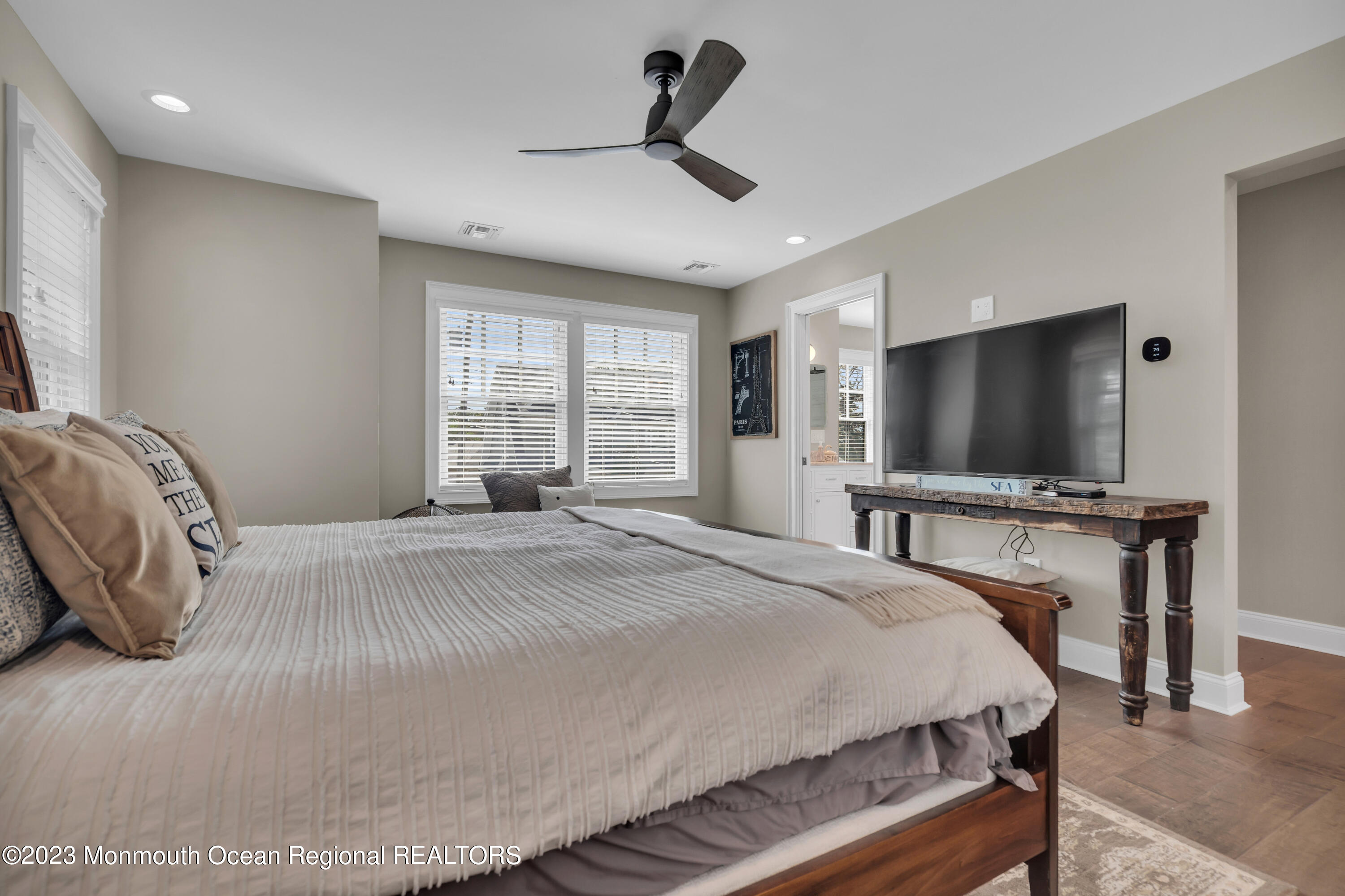 2118 Edgewood Place, Unit JULY Spring Lake, NJ 07762 - Photo 28 of 61 a bedroom with a bed and a flat screen tv