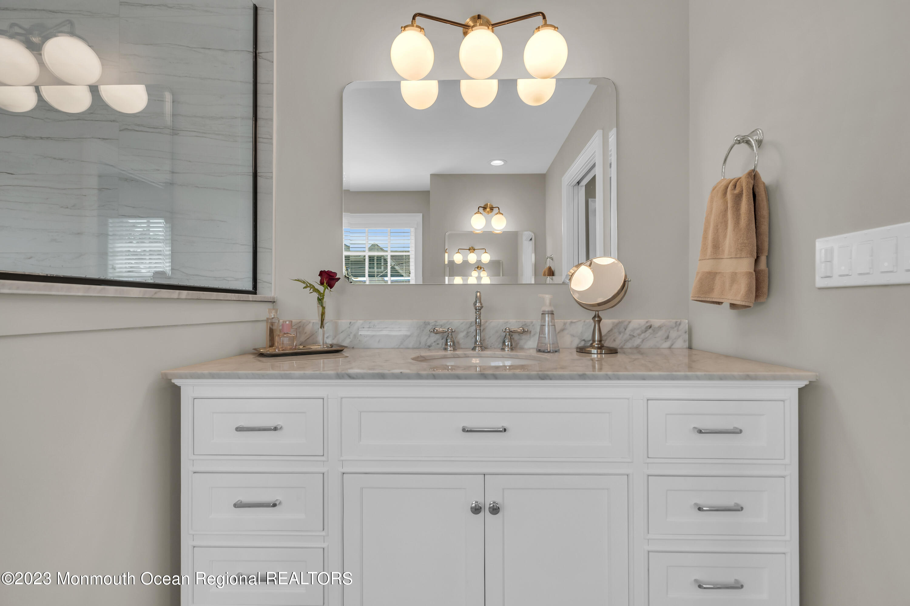 2118 Edgewood Place, Unit JULY Spring Lake, NJ 07762 - Photo 29 of 61 a bathroom with a sink vanity and a mirror