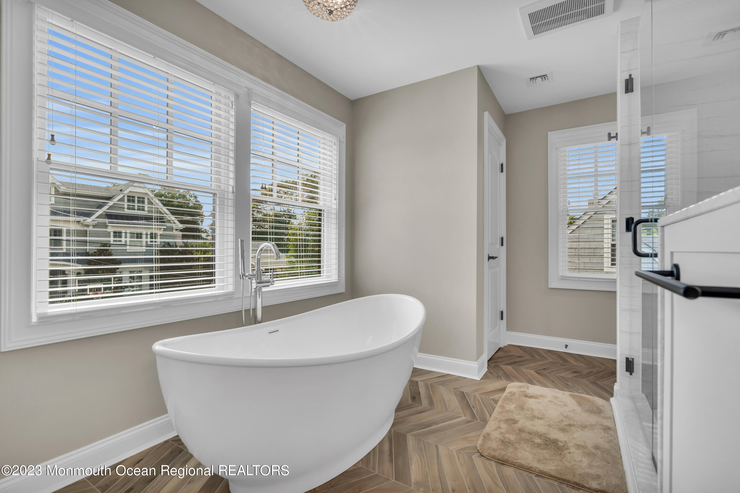 2118 Edgewood Place, Unit JULY Spring Lake, NJ 07762 - Photo 32 of 61 a spacious bathroom with a bathtub and window