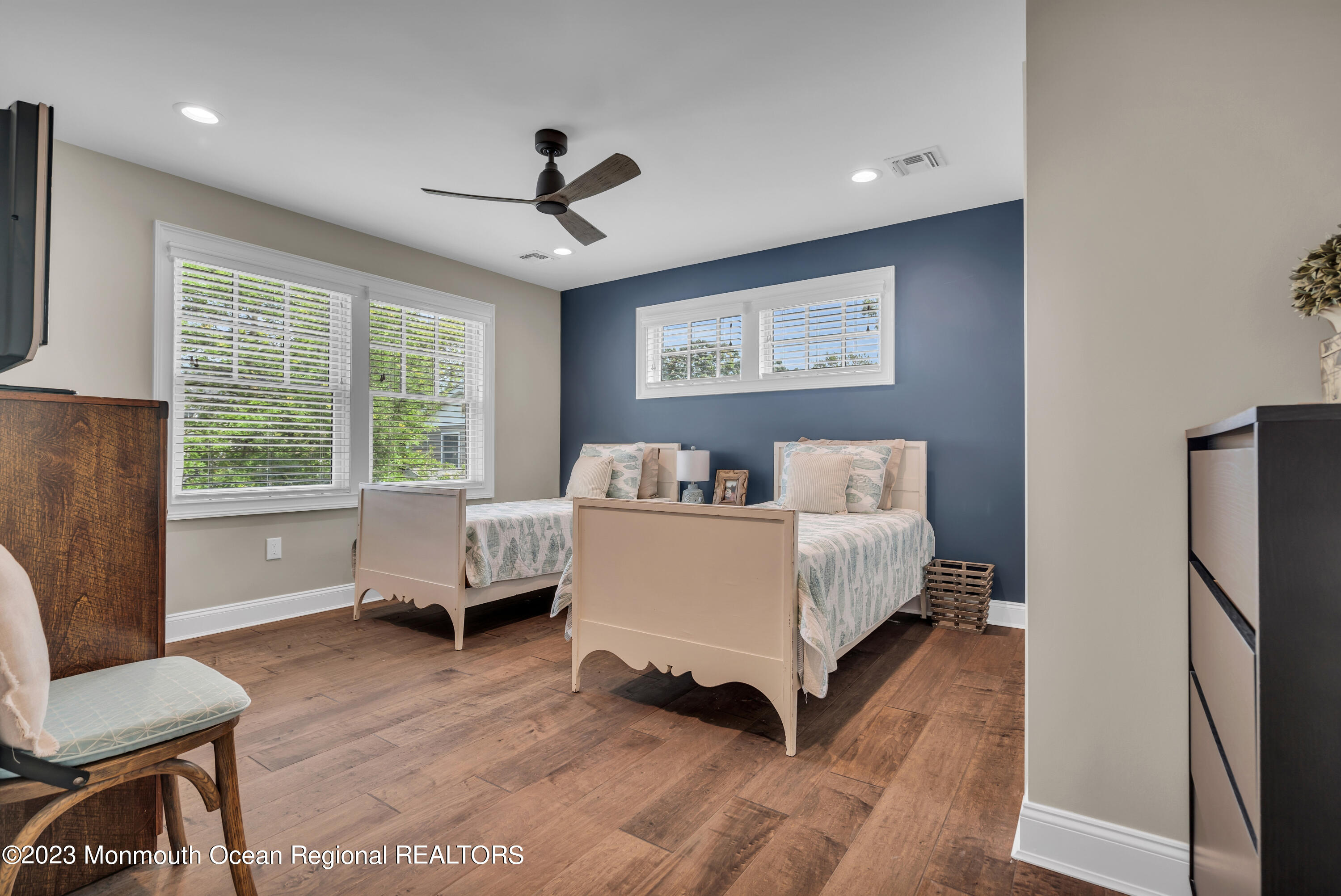 2118 Edgewood Place, Unit JULY Spring Lake, NJ 07762 - Photo 36 of 61 a spacious bedroom with a bed and a window