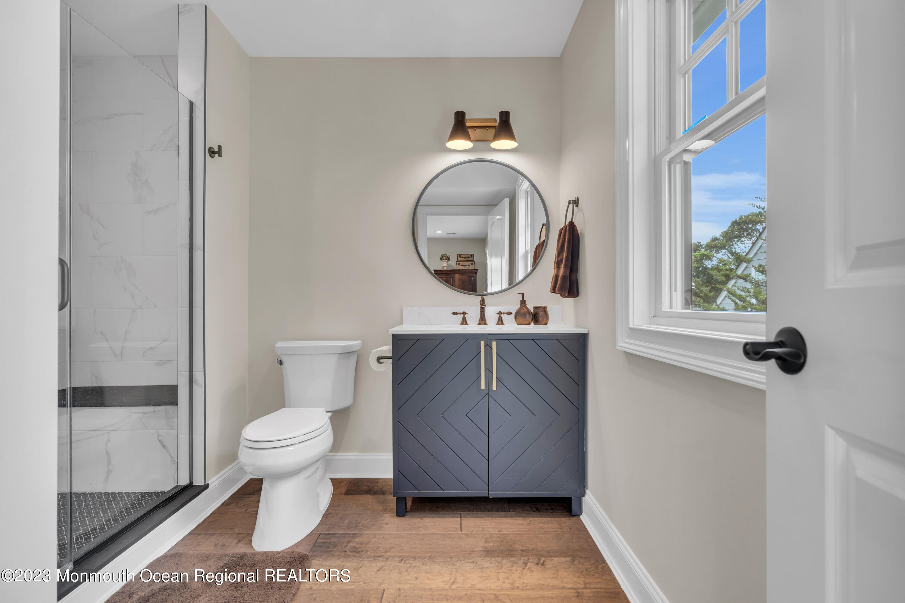 2118 Edgewood Place, Unit JULY Spring Lake, NJ 07762 - Photo 39 of 61 a bathroom with a toilet a sink and a mirror