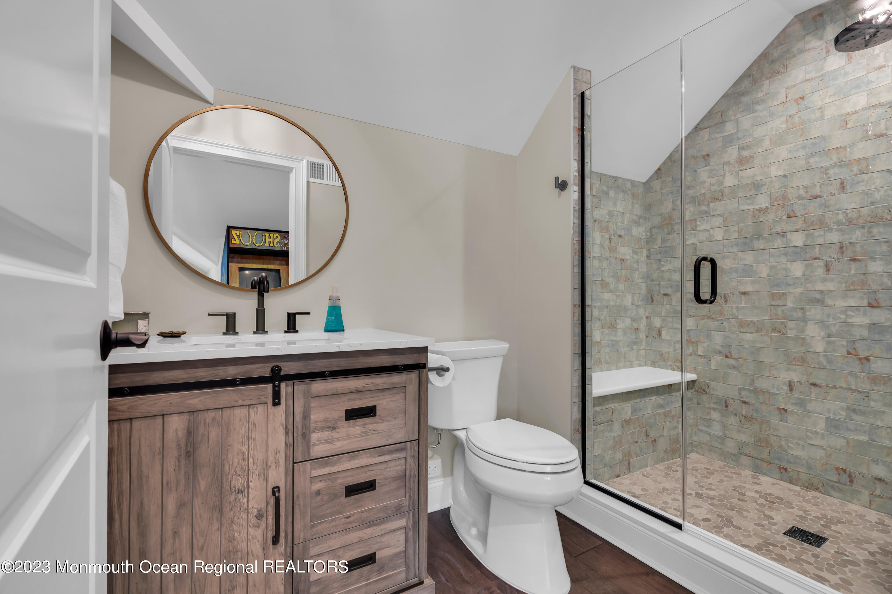 2118 Edgewood Place, Unit JULY Spring Lake, NJ 07762 - Photo 47 of 61 a bathroom with a toilet a sink and mirror