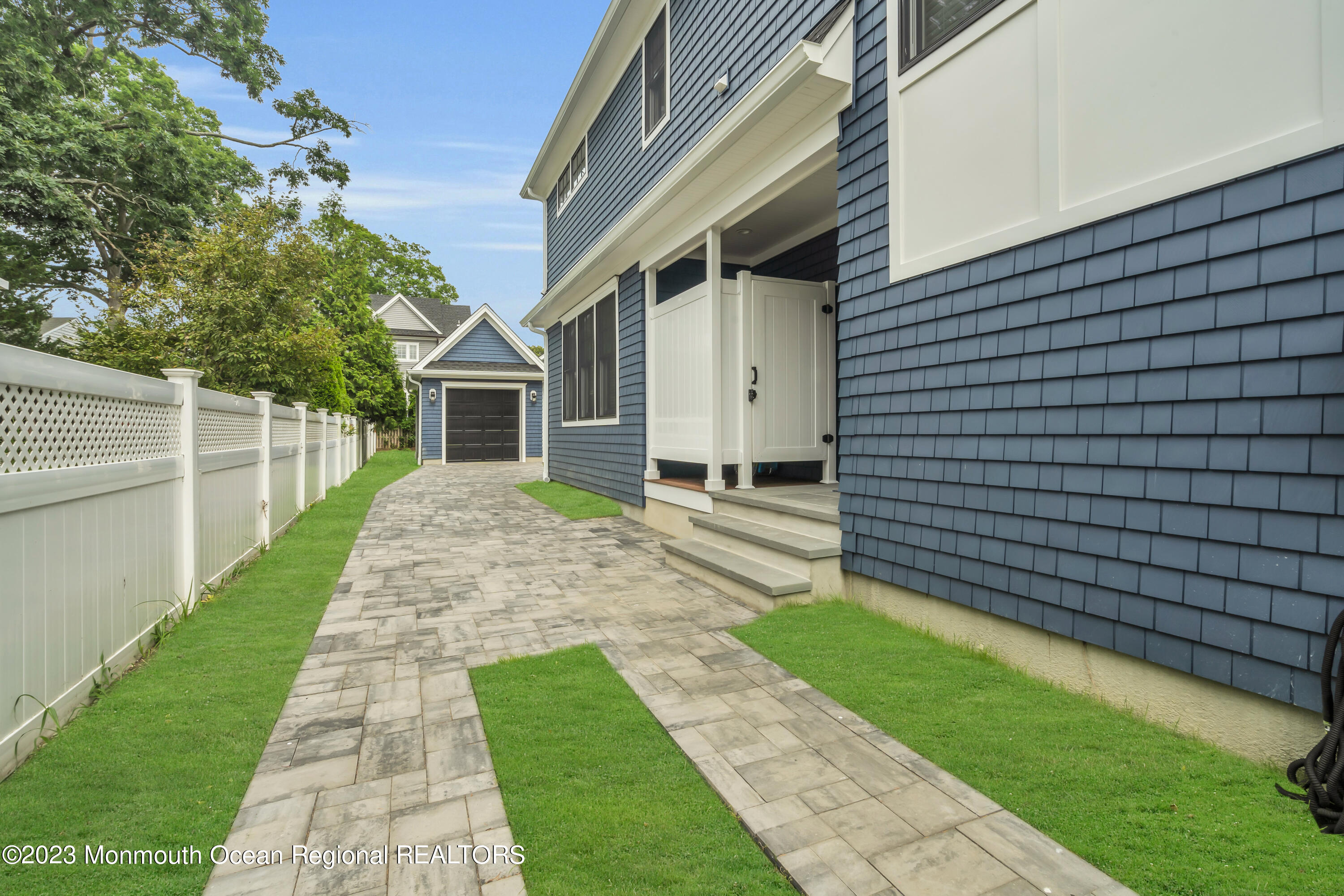 2118 Edgewood Place, Unit JULY Spring Lake, NJ 07762 - Photo 49 of 61 a view of a house with a yard
