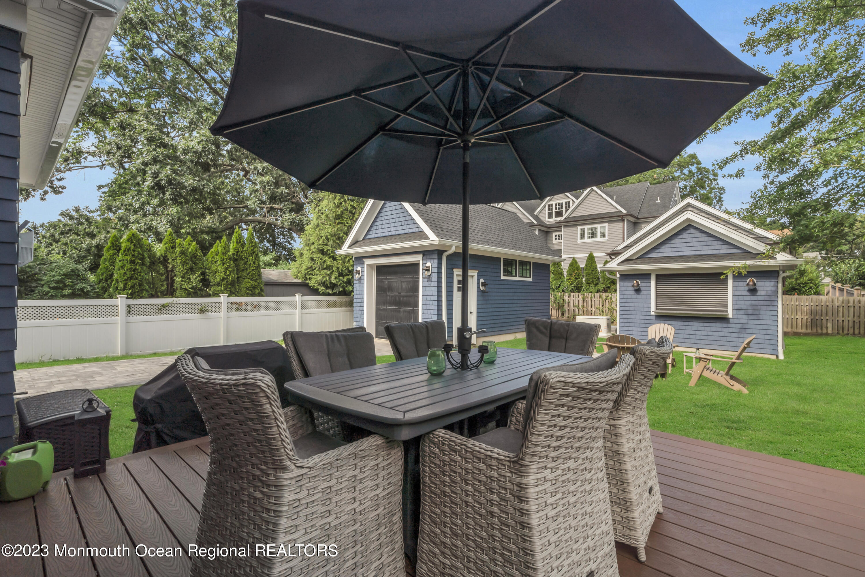2118 Edgewood Place, Unit JULY Spring Lake, NJ 07762 - Photo 52 of 61 a view of backyard of house with seating space