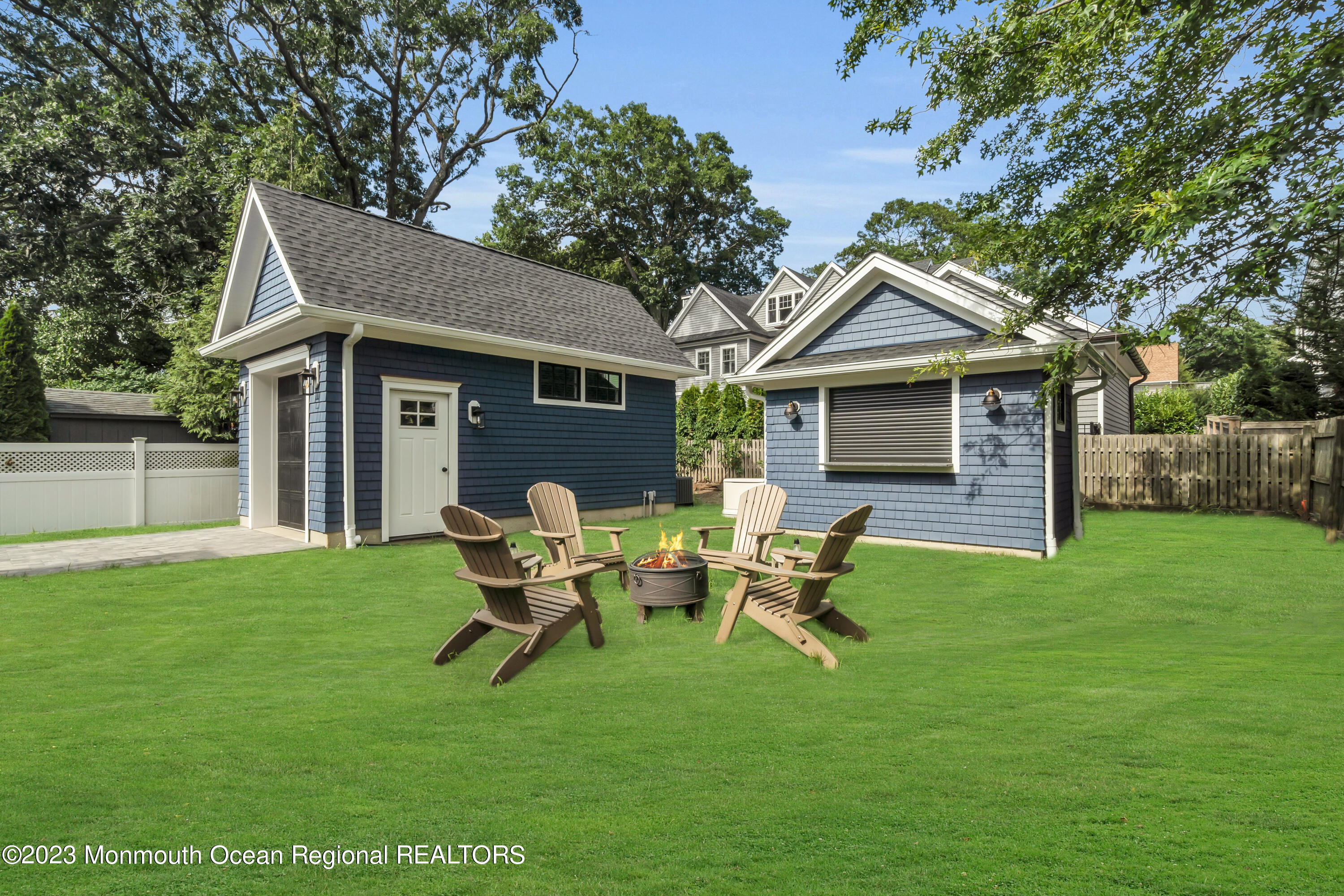 2118 Edgewood Place, Unit JULY Spring Lake, NJ 07762 - Photo 58 of 61 a view of a house with backyard sitting area and garden