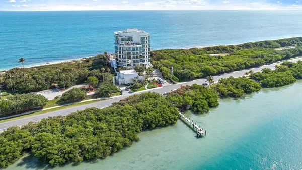 a view of a lake with a building in the background