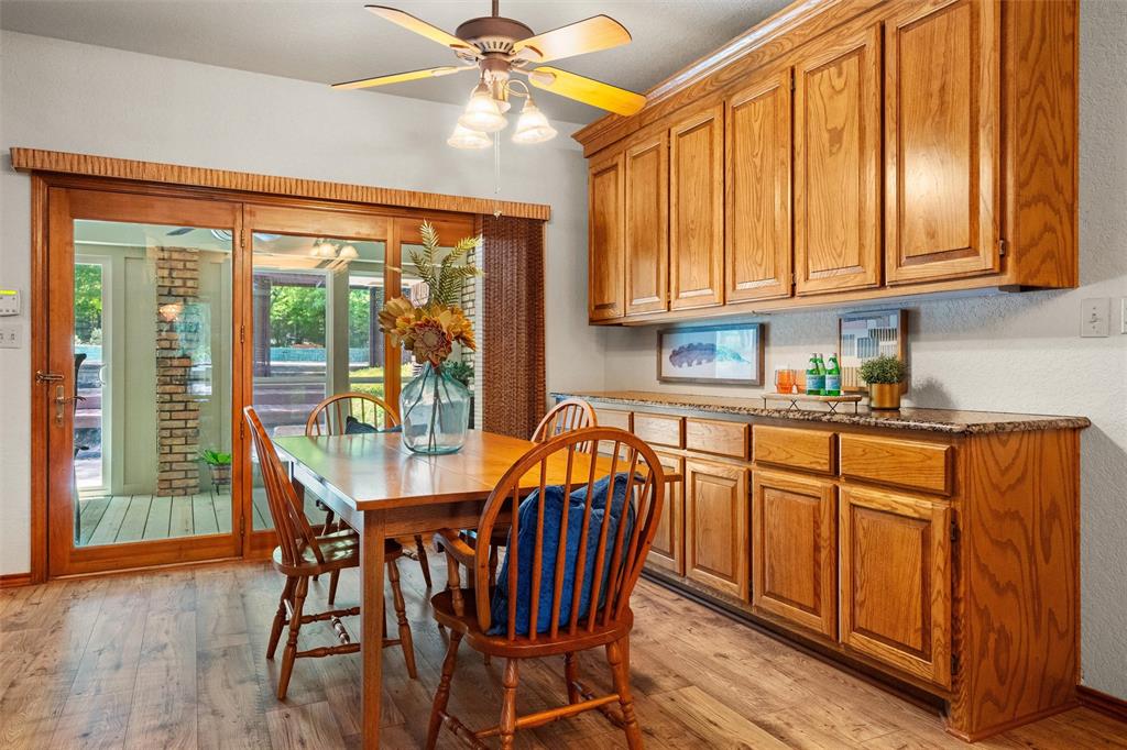 217 Valley Ranch Road Weatherford, TX 76087 - Photo 16 of 38 Wood-finish flooring throughout the dining area